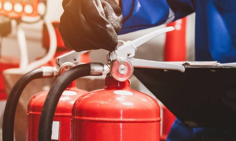 Checking a fire extinguisher